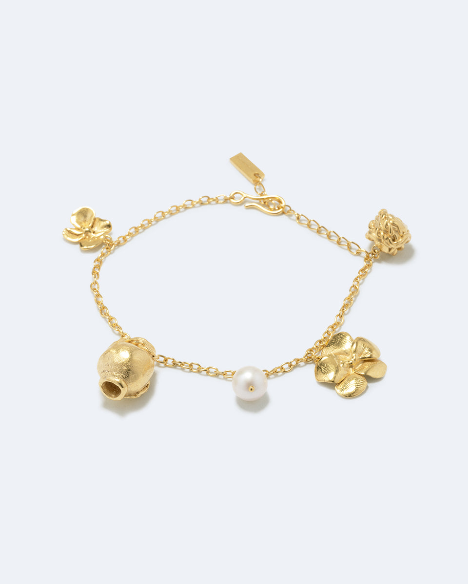 Journey Through Memory - Pearl and Gold Plated Charm Bracelet
