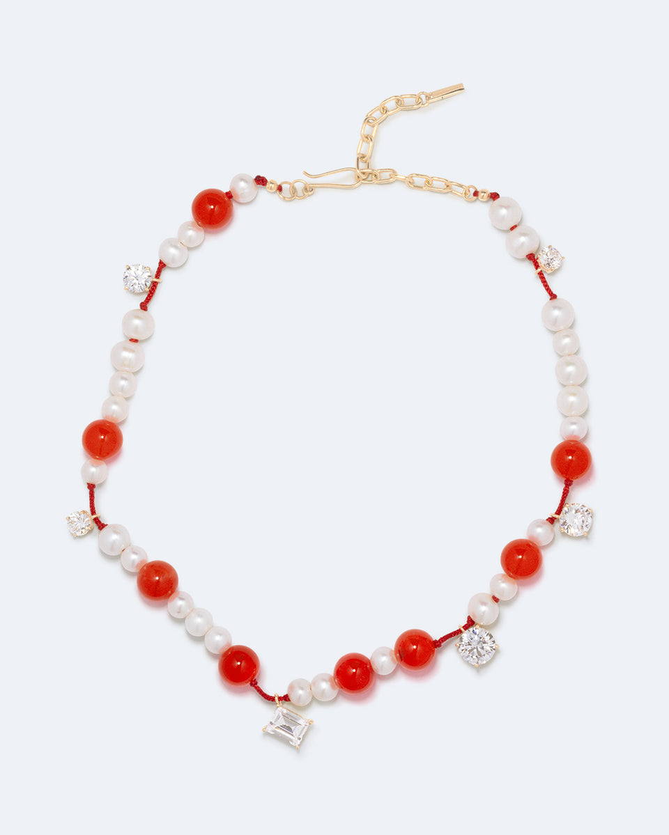 Une série de perturbations mineures – Collier en vermeil d’or recyclé avec perle, zircon et quartz orange