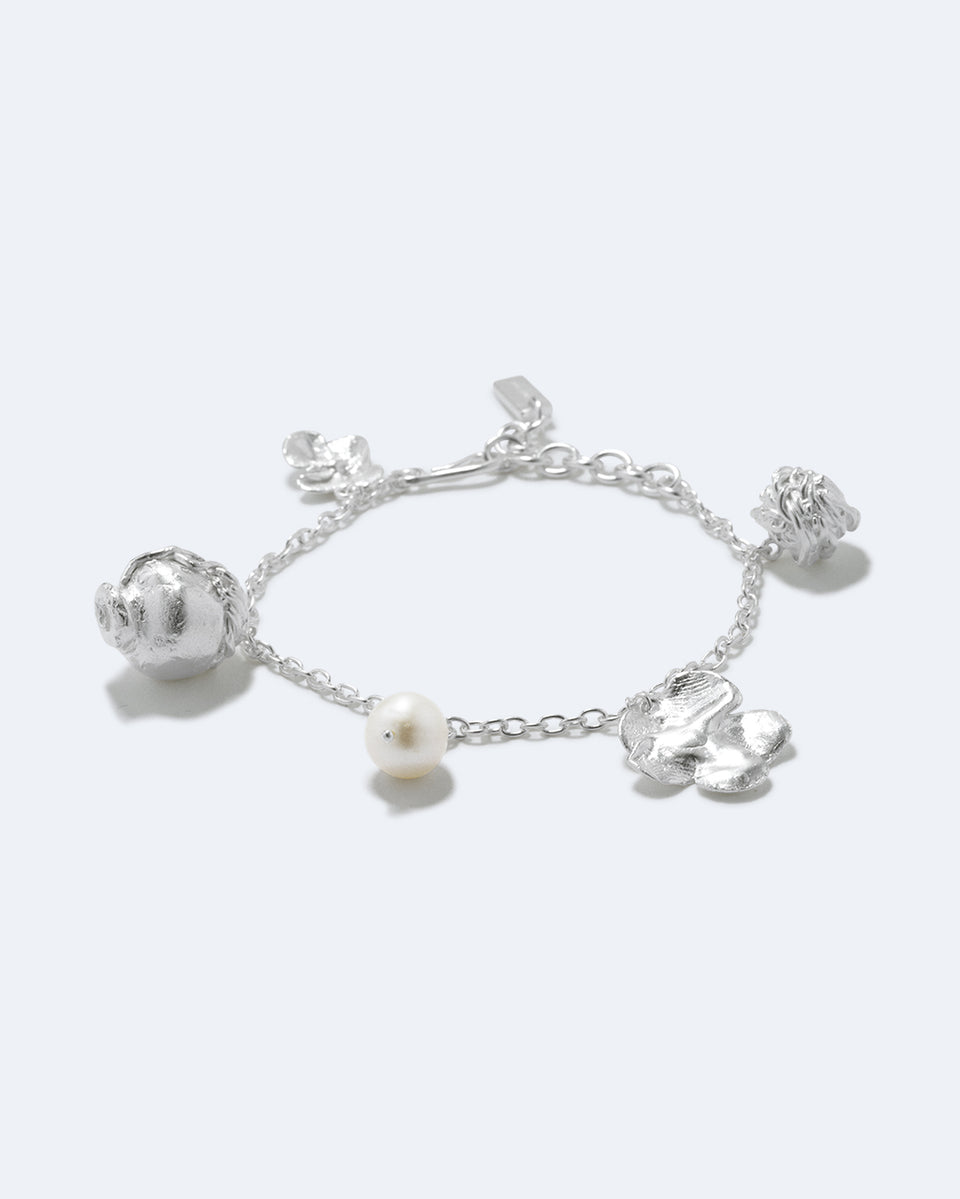 Journey Through Memory - Pearl and Silver Plated Charm Bracelet