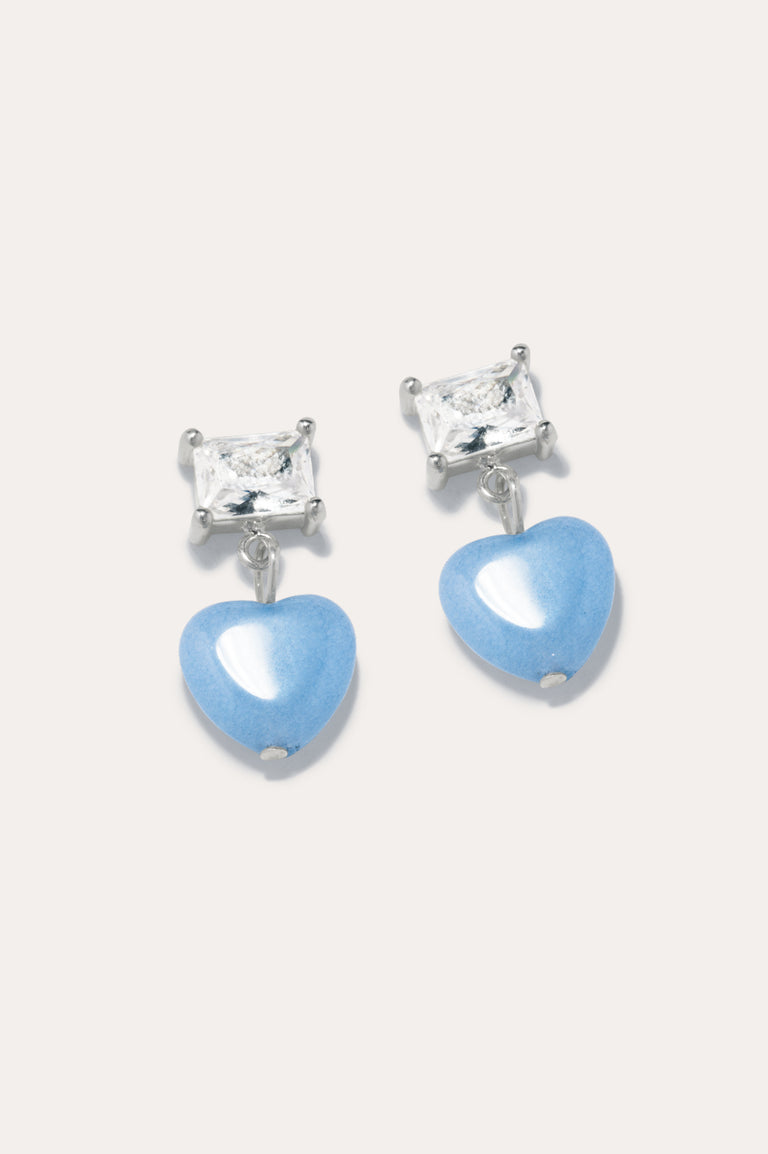 La fenêtre du cœur - Boucles d'oreilles en argent recyclé avec perle cœur bleue et oxyde de zirconium