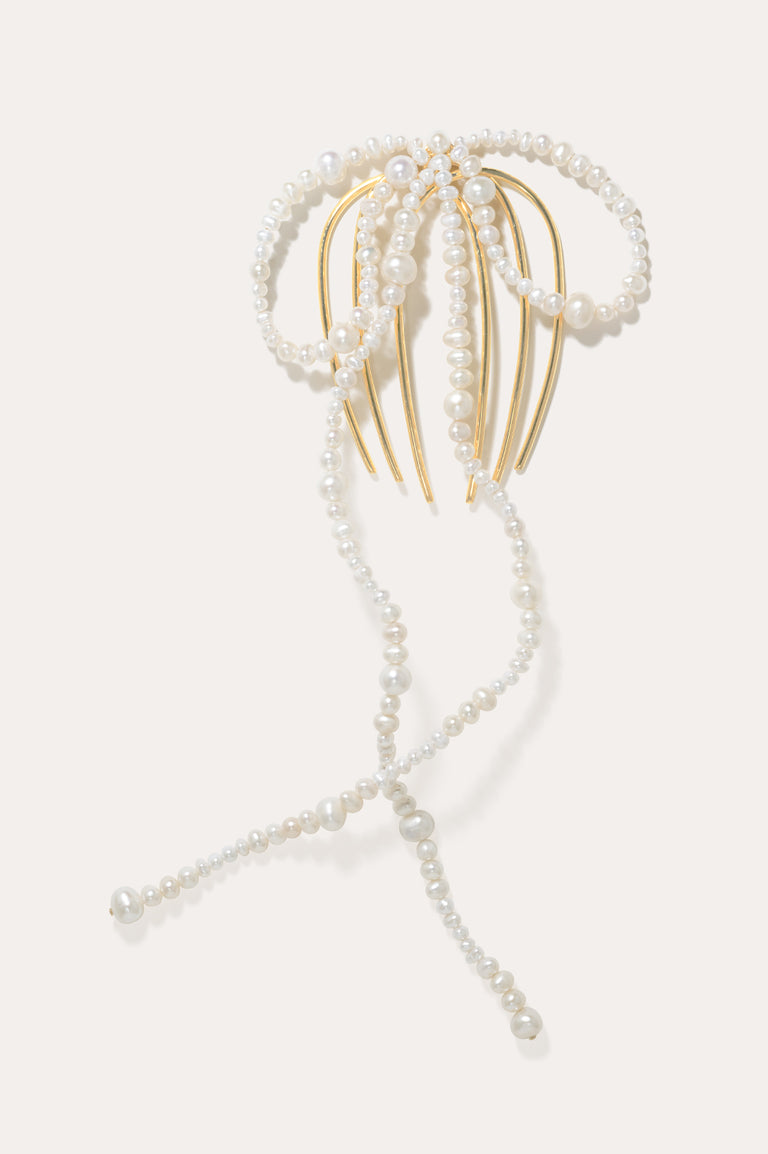 P189 - Peigne à cheveux long orné d'un nœud en perles et plaqué or