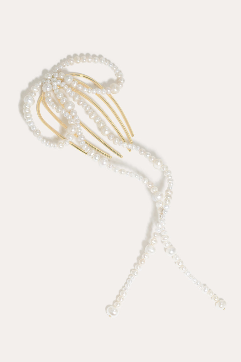 P189 - Peigne à cheveux long orné d'un nœud en perles et plaqué or