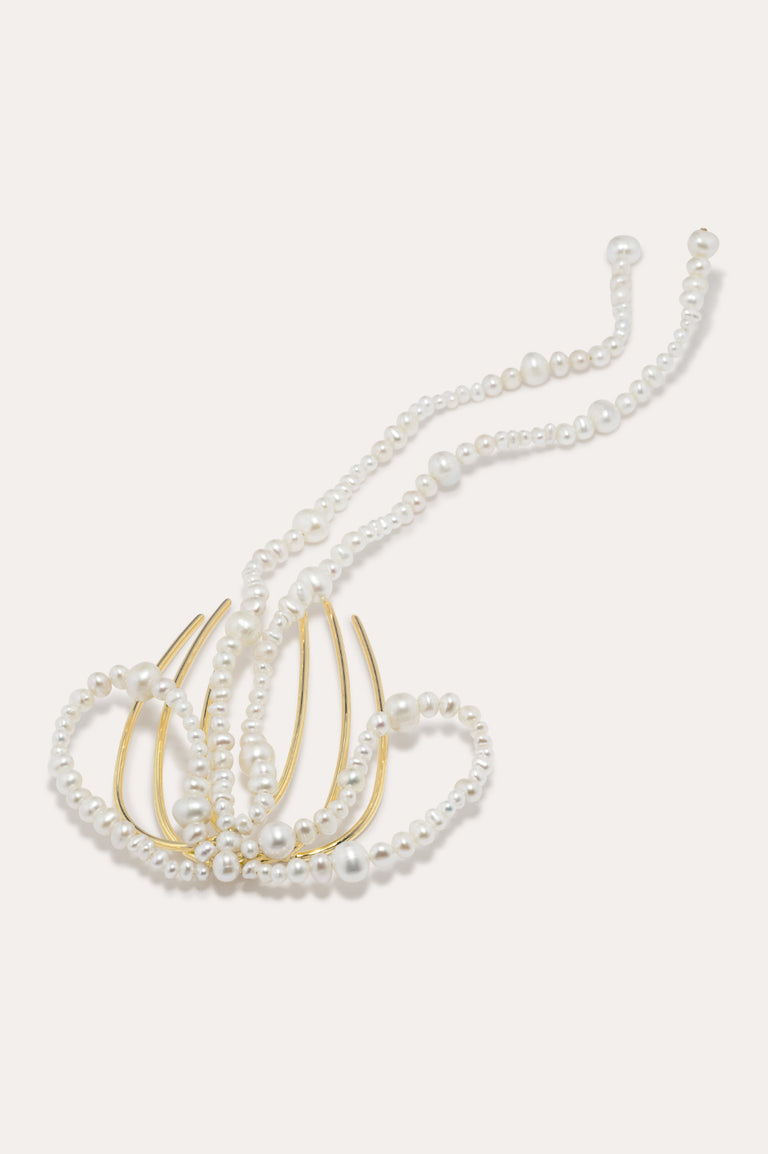 P189 - Peigne à cheveux long orné d'un nœud en perles et plaqué or