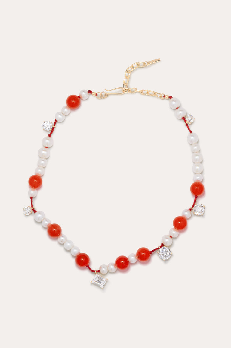 Une série de perturbations mineures – Collier en vermeil d’or recyclé avec perle, zircon et quartz orange