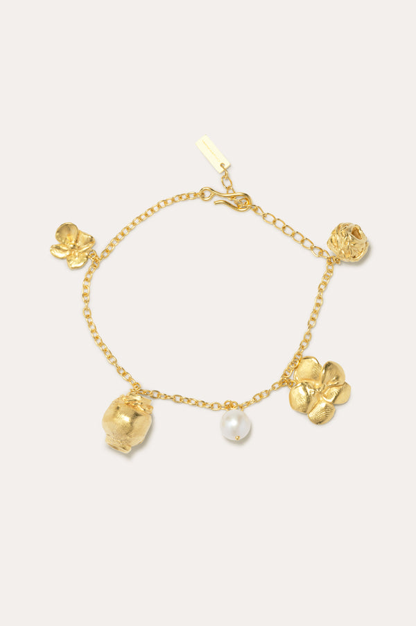 Voyage à travers la mémoire - Bracelet à breloques plaqué or et perles