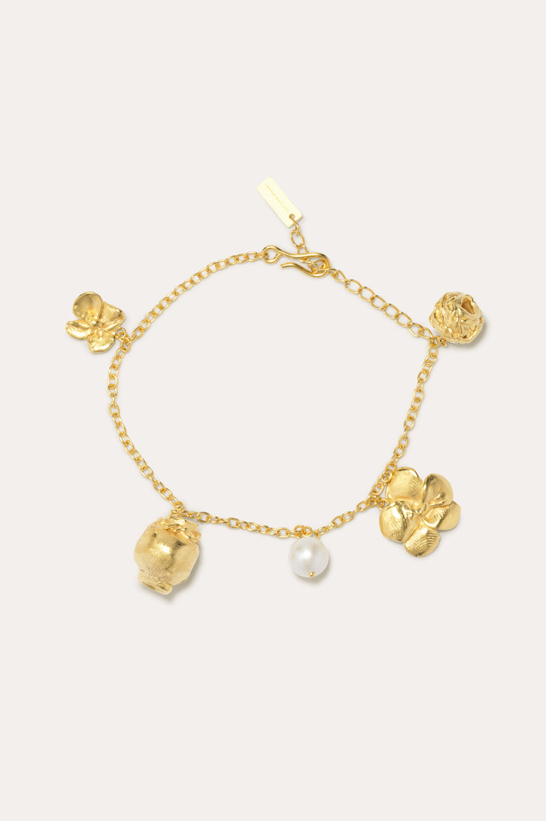 Voyage à travers la mémoire - Bracelet à breloques plaqué or et perles