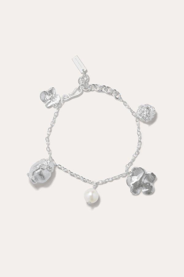 Journey Through Memory - Pearl and Silver Plated Charm Bracelet