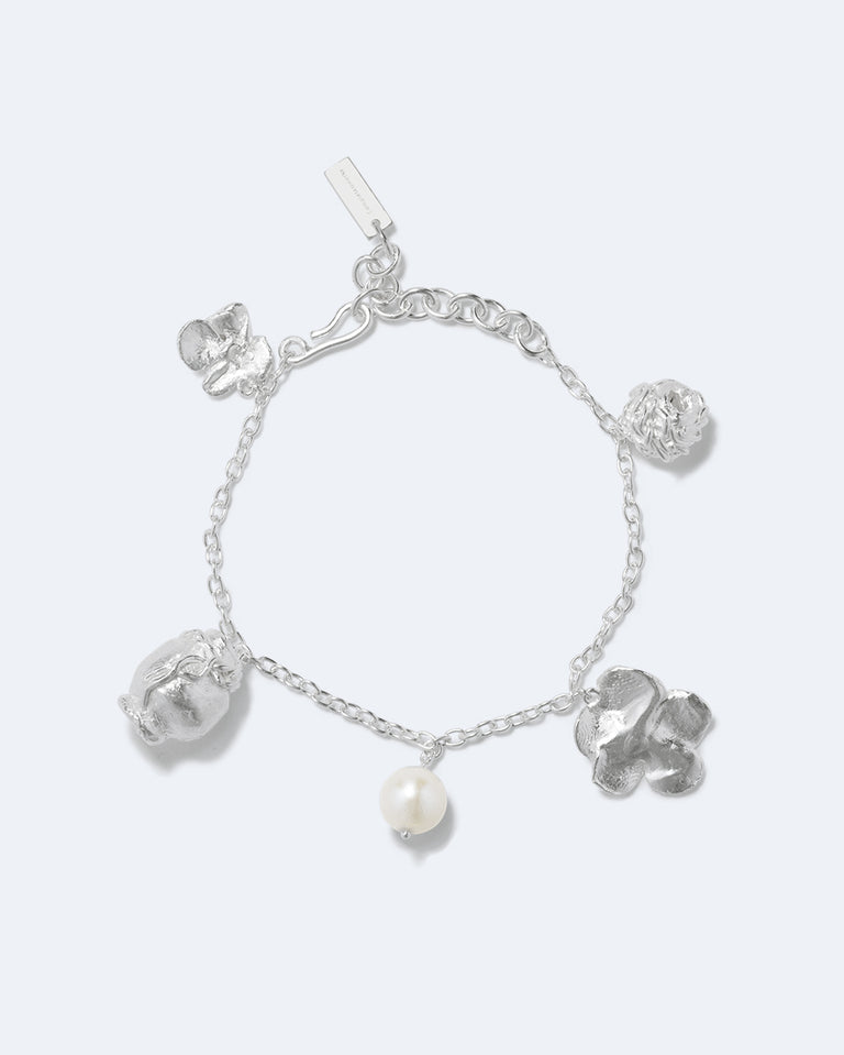 Journey Through Memory - Pearl and Silver Plated Charm Bracelet