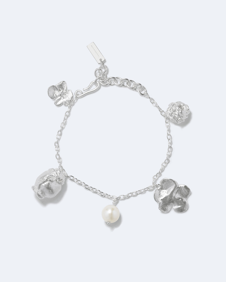 Journey Through Memory - Pearl and Silver Plated Charm Bracelet