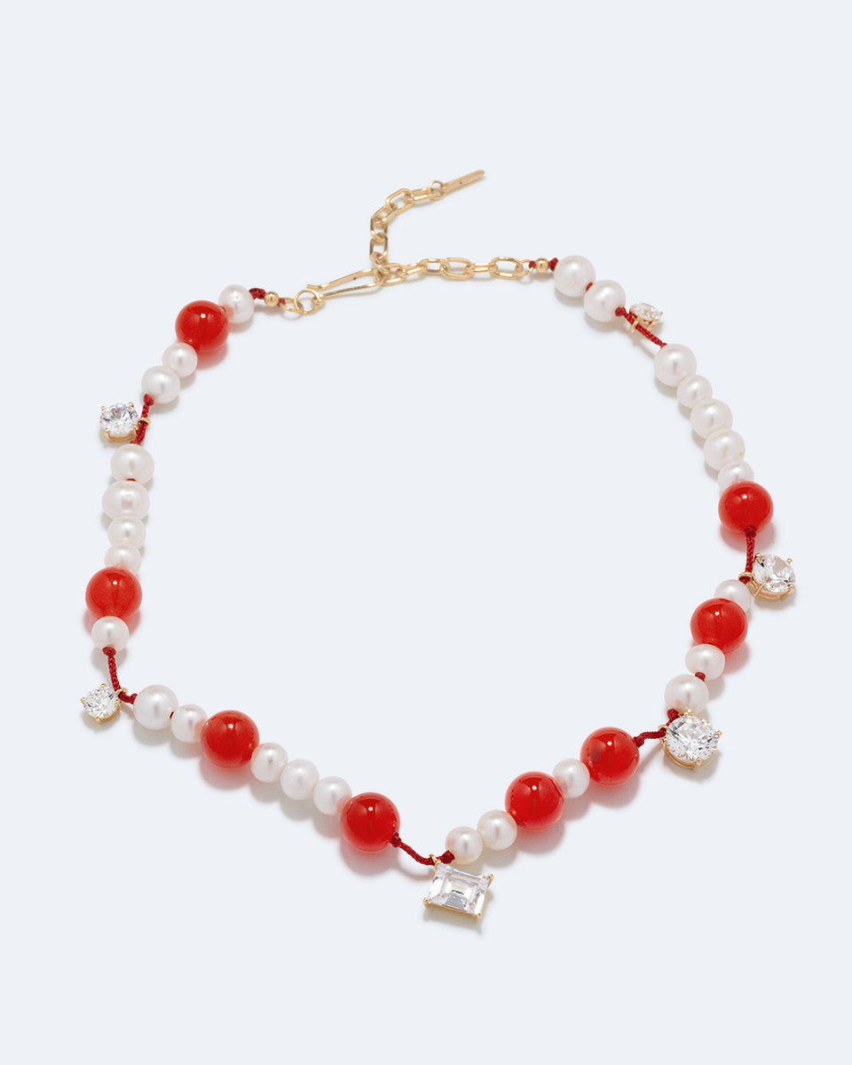 Une série de perturbations mineures – Collier en vermeil d’or recyclé avec perle, zircon et quartz orange
