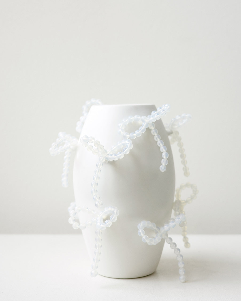 "Notsobig" Power, Corruption, Lies - Small Vase In Matte White w/ Iridescent Opalite Bows