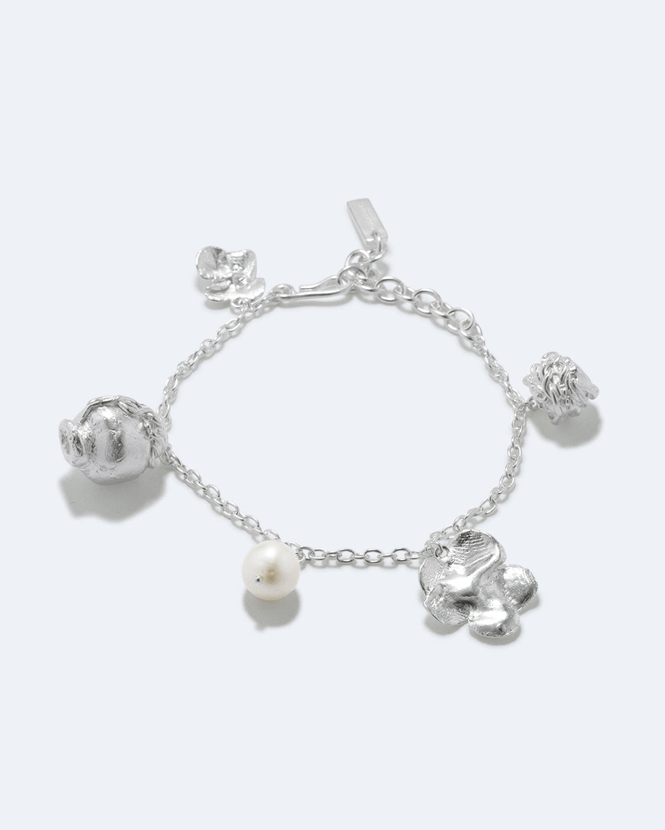 Journey Through Memory - Pearl and Silver Plated Charm Bracelet