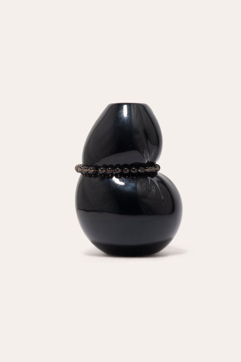Squeezed - Petit vase en noir lustré avec onyx noir