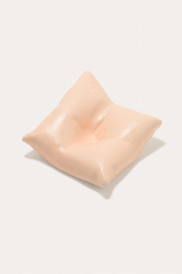 Bumped II - Coussin en céramique pêche mat