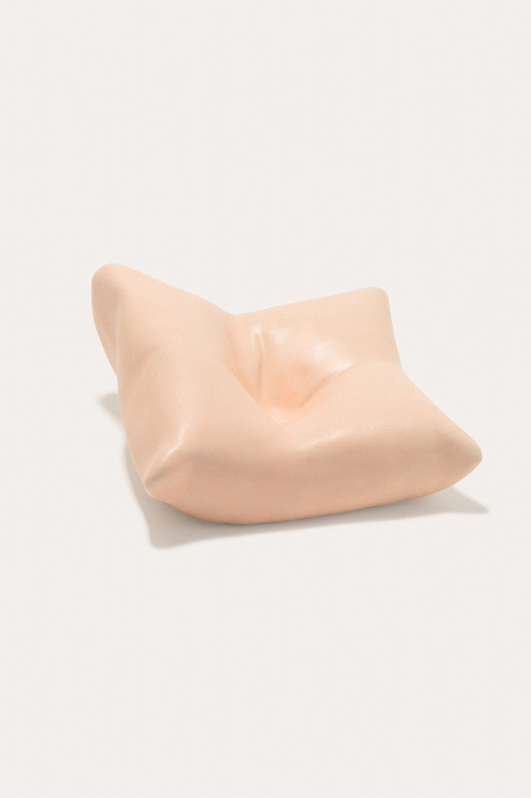 Bumped II - Coussin en céramique pêche mat