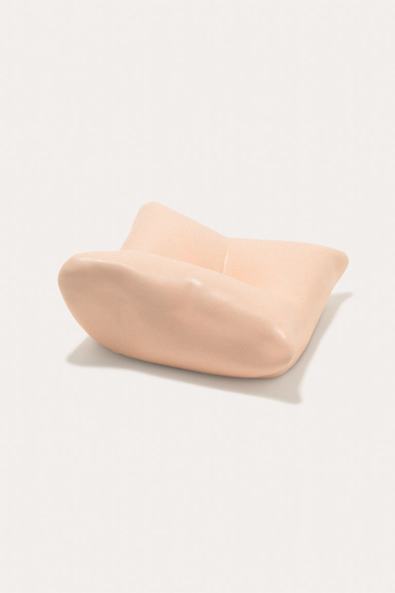 Bumped II - Coussin en céramique pêche mat