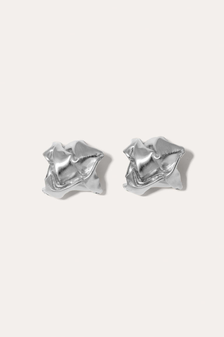 Crunched: A Tale of Abandoned Legal Strategies - Platinum Plated Earrings