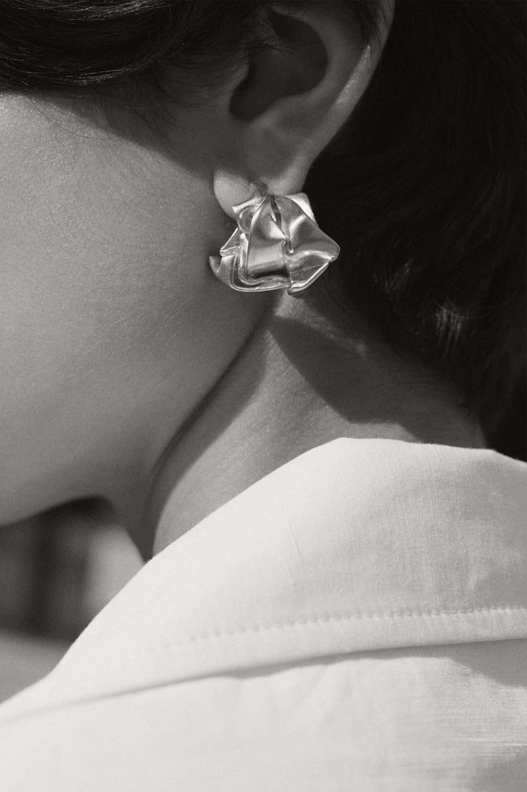 Croustillant : Une histoire de stratégies juridiques abandonnées – Boucles d'oreilles en argent recyclé